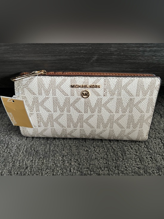 Michael Kors Handbags - Michael Kors Beige Signature Zip Wallet